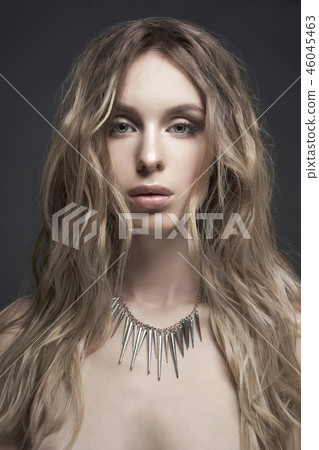 Young beautiful blonde with silver necklace 46045463