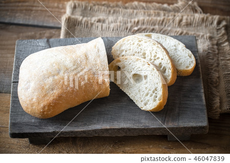 Ciabatta on the wooden board Ciabatta on the wooden board 46047839