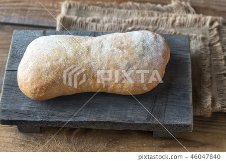 Ciabatta on the wooden board Ciabatta on the wooden board 46047840