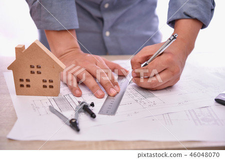 Engineering concept. The engineer is working in the office. Engi Engineering concept. The engineer is working in the office. Engi 46048070