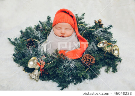 Newborn baby wrapped in a diaper Newborn baby wrapped in a diaper 46048228