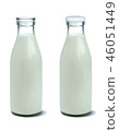 Filled unopened and opened milk bottle isolated  46051449