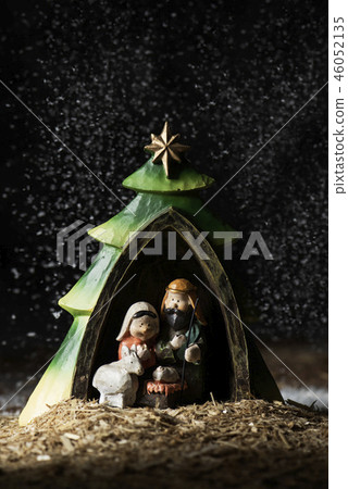the holy family in a rustic nativity scene 46052135