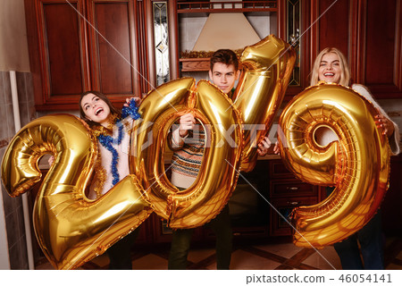 New 2019 Year is coming. Group of cheerful New 2019 Year is coming. Group of cheerful 46054141