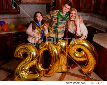 New 2019 Year is coming. Group of cheerful New 2019 Year is coming. Group of cheerful 46054155