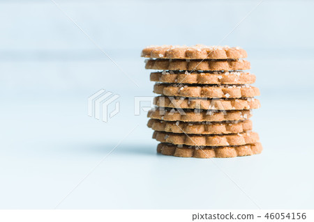 Christmas biscuits with sugar crystals. Christmas biscuits with sugar crystals. 46054156