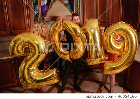 New 2019 Year is coming. Group of cheerful New 2019 Year is coming. Group of cheerful 46054160