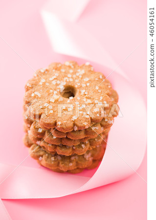 Christmas biscuits with sugar crystals. Christmas biscuits with sugar crystals. 46054161