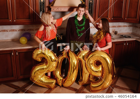 New 2019 Year is coming. Group of cheerful New 2019 Year is coming. Group of cheerful 46054164