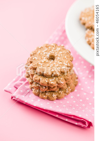 Christmas biscuits with sugar crystals. Christmas biscuits with sugar crystals. 46054165