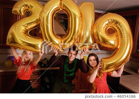 New 2019 Year is coming. Group of cheerful New 2019 Year is coming. Group of cheerful 46054166