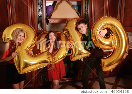 New 2019 Year is coming. Group of cheerful New 2019 Year is coming. Group of cheerful 46054168