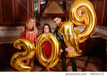 New 2019 Year is coming. Group of cheerful New 2019 Year is coming. Group of cheerful 46054171
