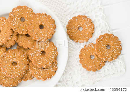 Christmas biscuits with sugar crystals. Christmas biscuits with sugar crystals. 46054172