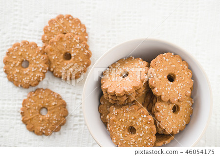 Christmas biscuits with sugar crystals. Christmas biscuits with sugar crystals. 46054175