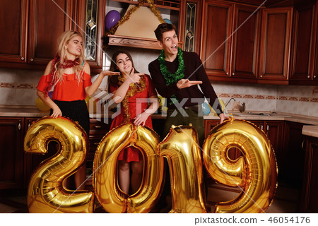 New 2019 Year is coming. Group of cheerful New 2019 Year is coming. Group of cheerful 46054176