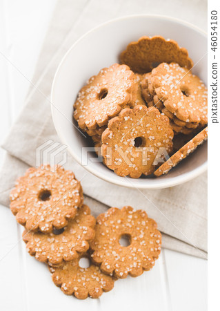 Christmas biscuits with sugar crystals. Christmas biscuits with sugar crystals. 46054180