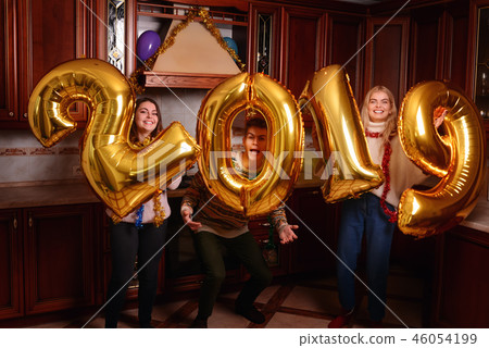 New 2019 Year is coming. Group of cheerful New 2019 Year is coming. Group of cheerful 46054199