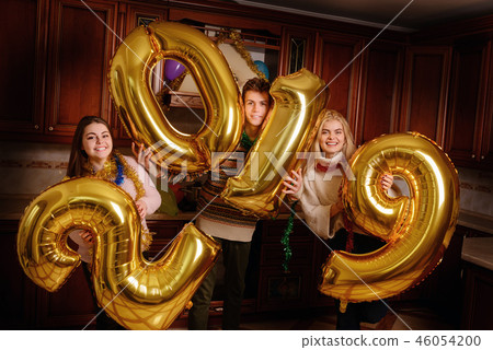 New 2019 Year is coming. Group of cheerful New 2019 Year is coming. Group of cheerful 46054200