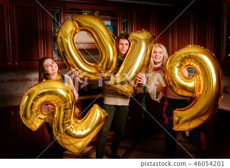 New 2019 Year is coming. Group of cheerful New 2019 Year is coming. Group of cheerful 46054201