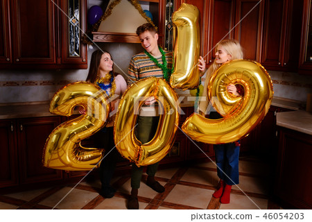 New 2019 Year is coming. Group of cheerful New 2019 Year is coming. Group of cheerful 46054203