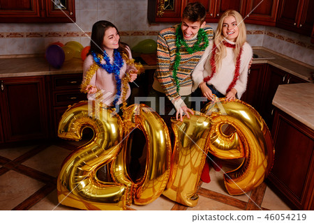 New 2019 Year is coming. Group of cheerful New 2019 Year is coming. Group of cheerful 46054219