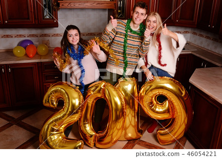 New 2019 Year is coming. Group of cheerful New 2019 Year is coming. Group of cheerful 46054221