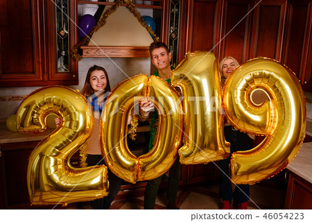 New 2019 Year is coming. Group of cheerful New 2019 Year is coming. Group of cheerful 46054223