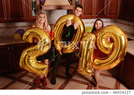 New 2019 Year is coming. Group of cheerful New 2019 Year is coming. Group of cheerful 46054227