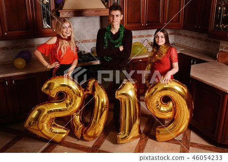 New 2019 Year is coming. Group of cheerful New 2019 Year is coming. Group of cheerful 46054233