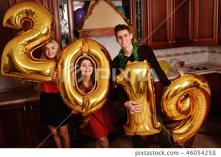 New 2019 Year is coming. Group of cheerful New 2019 Year is coming. Group of cheerful 46054258