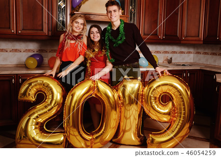 New 2019 Year is coming. Group of cheerful New 2019 Year is coming. Group of cheerful 46054259