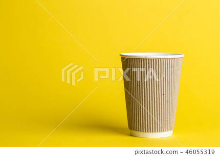 coffee in a glass on a yellow background 46055319