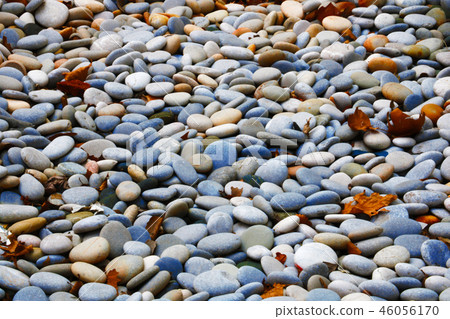 Abstract smooth round pebbles sea texture background. 46056170