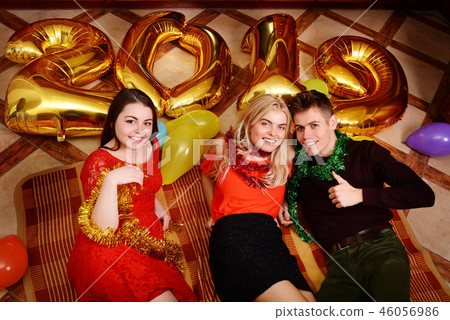 New 2019 Year is coming. Group of cheerful New 2019 Year is coming. Group of cheerful 46056986