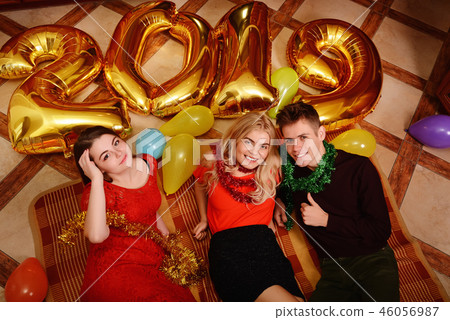 New 2019 Year is coming. Group of cheerful New 2019 Year is coming. Group of cheerful 46056987