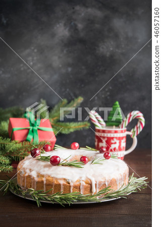 Christmas cake with garnish cranberry and rosemary 46057160