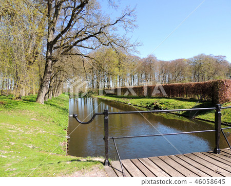 Regular park, castle of Menkemaborg,  Netherlands 46058645