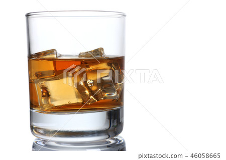 Whiskey with ice in a glass isolated 46058665