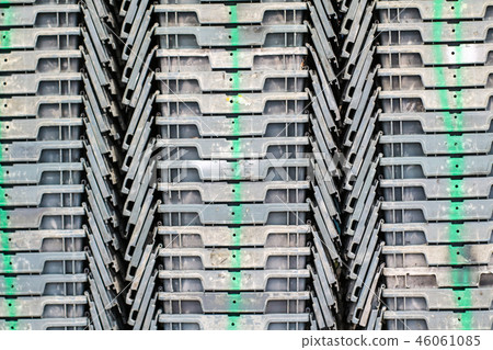 Plastic containers are stacked perfectly together 46061085