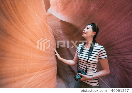 tourist feeling the rock visiting antelope canyon tourist feeling the rock visiting antelope canyon 46061227