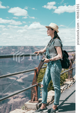 tourist hobby photographing by slr camera. 46061301