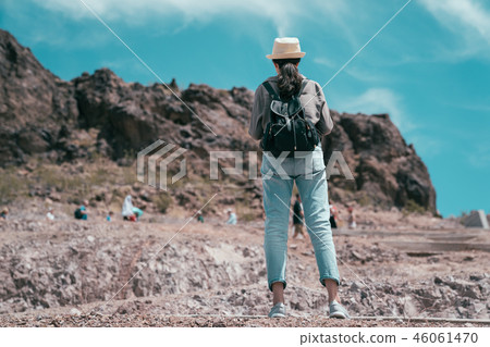 female backpacker sightseeing the nature 46061470