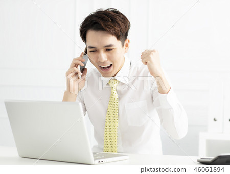 young businessman working with laptop in office young businessman working with laptop in office 46061894