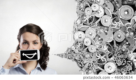 Woman presenting smartphone Woman presenting smartphone 46063634