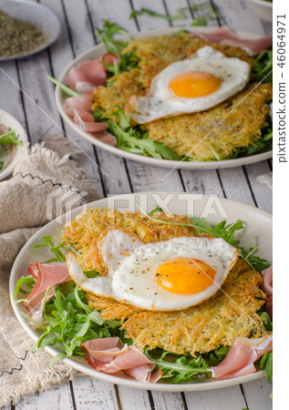 Potato pancakes with eggs and ham Potato pancakes with eggs and ham 46064971