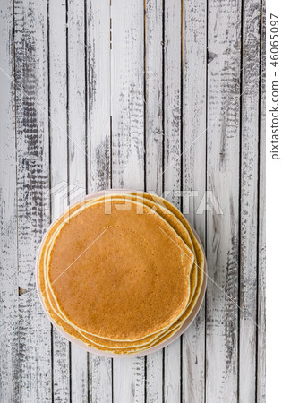 Homemade crepes with frozen berries, topped sugar 46065097