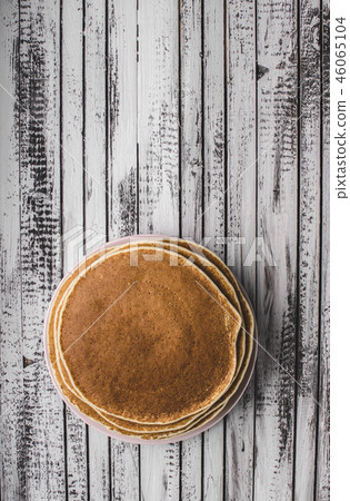 Homemade crepes with frozen berries, topped sugar 46065104