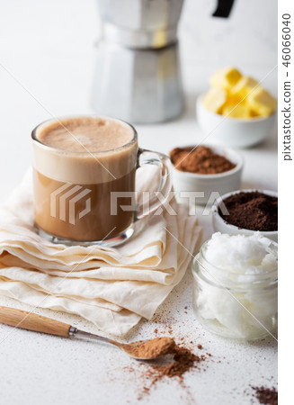 KETOGENIC KETO DIET DRINK. Coffe and cacao blended with coconut oil. Cup of bulletproof coffe with 46066040