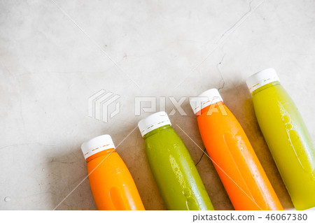 Bottles of cold pressed unprocessed juices Bottles of cold pressed unprocessed juices 46067380